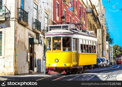 Vintage tram in the city center of Lisbon in a beautiful summer day, Portugal