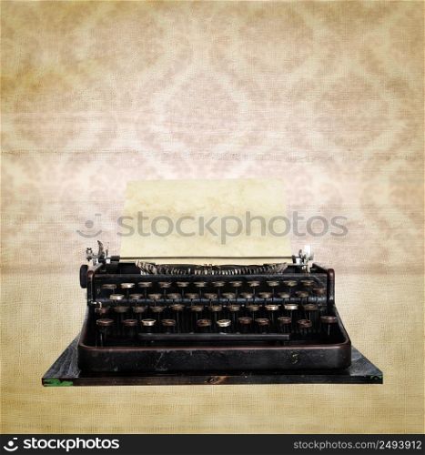 Vintage typewriter on retro background