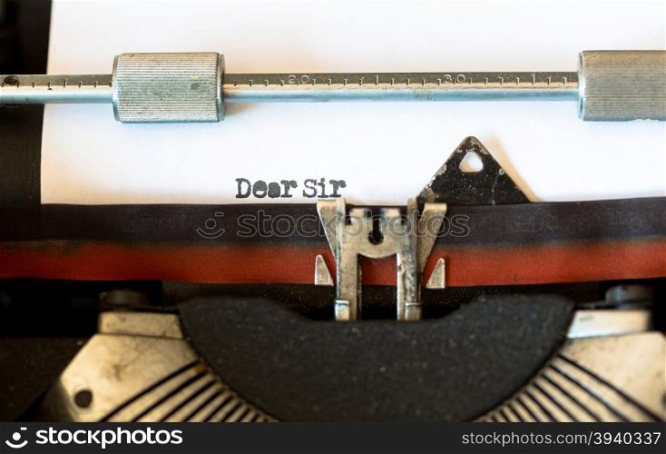 Vintage typewriter with a text that says dear sir