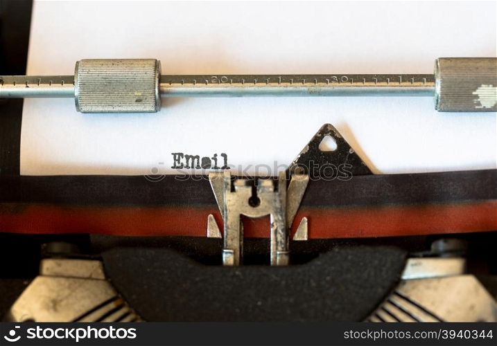 Vintage typewriter with a text that says email