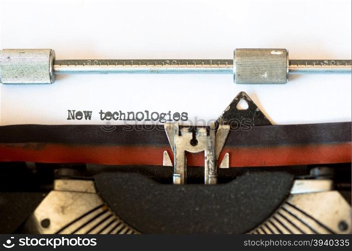 Vintage typewriter with a text that says new technologies