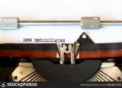 Vintage typewriter with a text that says new technologies