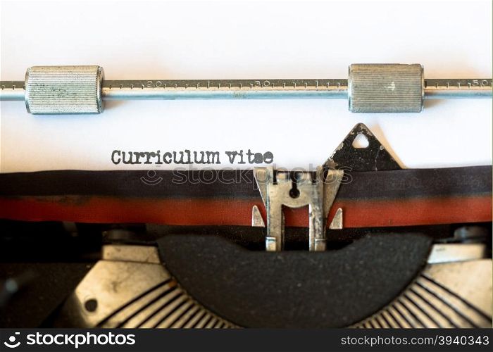 Vintage typewriter with a text that says resume