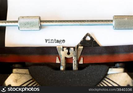 Vintage typewriter with a text that says vintage