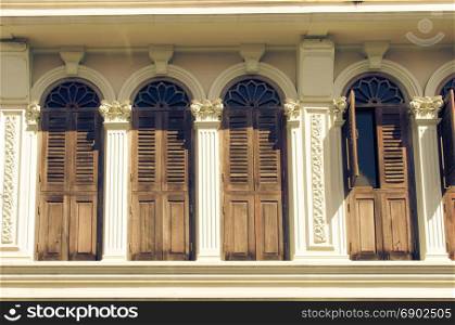 Vintage window with wood shutters