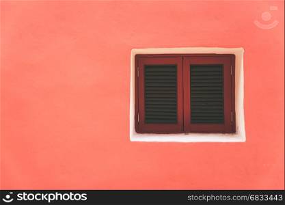 Vintage windows on the red wall