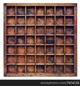 vintage wood printer (typesetter) drawer or shadow box with numerous dividers, isolated on white