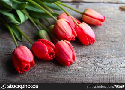 vintage wooden background with tulips
