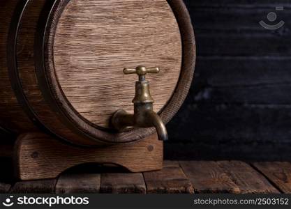 Vintage wooden barrel on rack