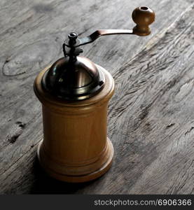 vintage wooden coffee grinder on the table