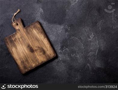 Vintage wooden cutting board. Kitchen cooking concept. Space for text
