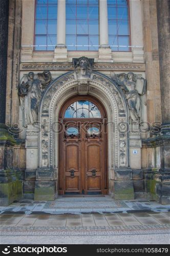 vintage wooden door with angel statues, Dresden, Saxony Germany. vintage wooden door, Dresden, Saxony Germany