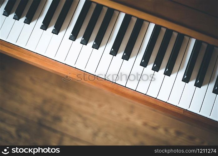 Vintage wooden piano keys with text space