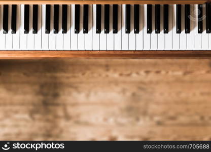 Vintage wooden piano keys with text space