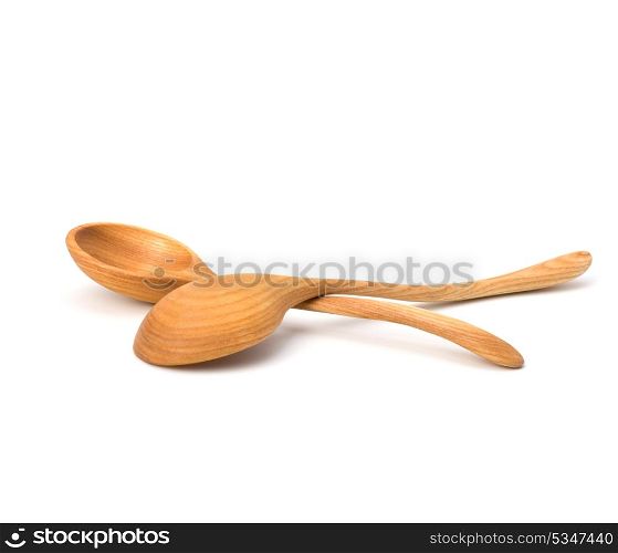 Vintage wooden spoons isolated on white background