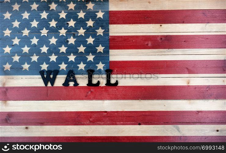 Vintage wooden United States flag with metal letters spelling wall for border concept