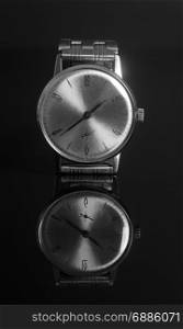 Vintage wrist watch on a black background