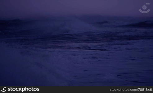 Violent ocean storm at night