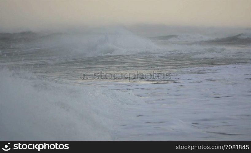 Violent waves crash near the coast