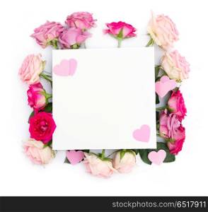 Violet and pink blooming roses. Violet and pink blooming fresh rose flowers and hearts, copy space copy space on paper note