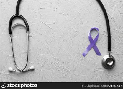 violet ribbon near black stethoscope plaster