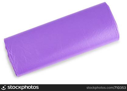Violet roll of plastic garbage bags isolated on white background