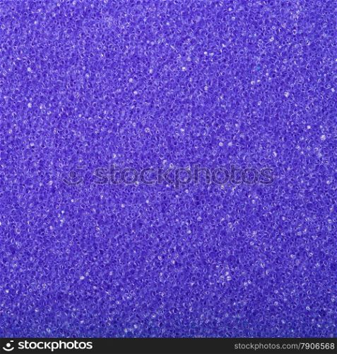 Violet texture cellulose foam sponge - background. Square format