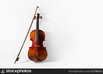Violin and bow on white background