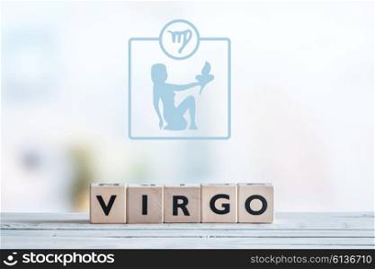 Virgo star sign on a wooden table