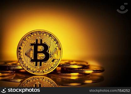 Virtual currency bitcoin on yellow background. The concept of developing a new virtual currency.. Virtual currency bitcoin on yellow background