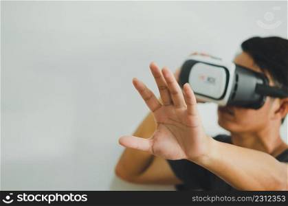 Virtual Experience. Excited Wearing VR Headset, Touching Air While Playing Video Game, Copy Space