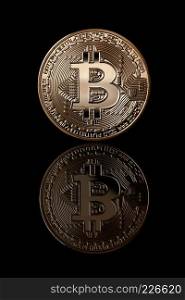 Virtual money bitcoin coins. Bitcoin gold coin from face side isolated on black background,. Business concept. Bitcoin cryptocurrency.. Bitcoin gold coin isolated on black background