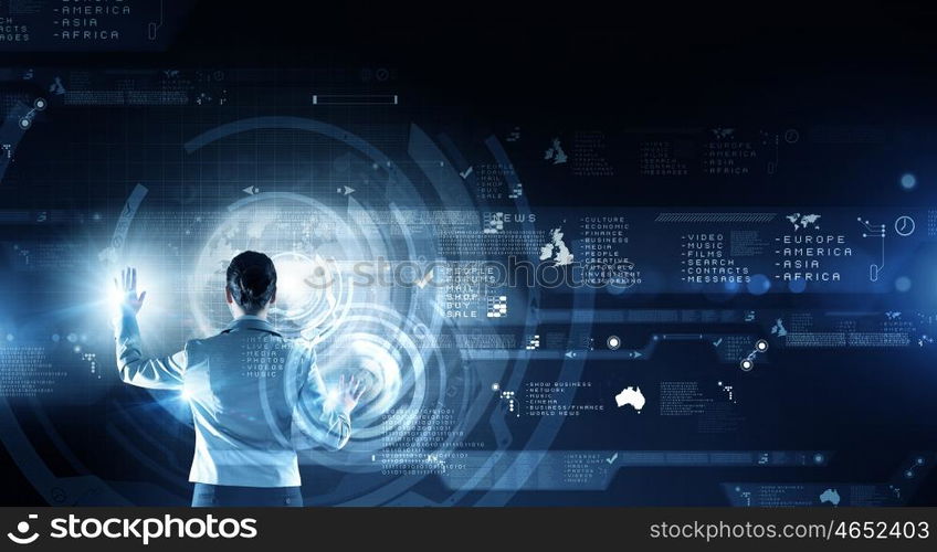 Virtual panel. Back view of businesswoman working with modern virtual technologies