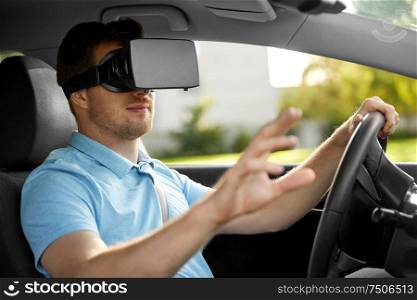 virtual reality, technology and driving concept - man or driver wearing vr glasses in car. man or driver wearing vr glasses and driving car