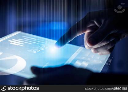 Virtual technologies. Close up of human hands using virtual panel