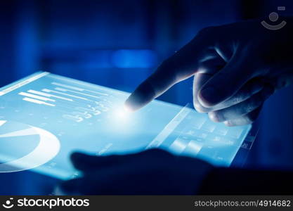 Virtual technologies. Close up of human hands using virtual panel