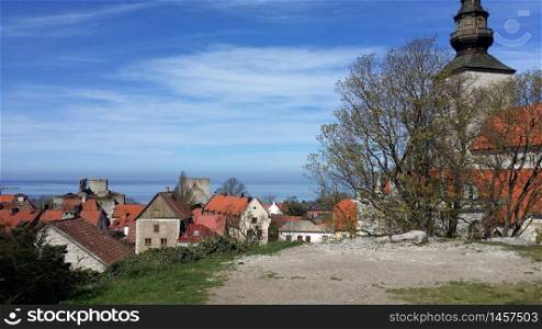 Visby, Sweden, May 5, 2019. A glimpse of the exterior of the ancient cathedral immediately outside the old town of Visby in Gotland in Sweden. A glimpse of the exterior of the ancient cathedral immediately outside the old town of Visby in Gotland in Sweden