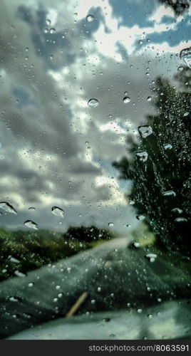 Visibility is limited when driving through a rain storm