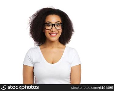 vision, body positive and people concept - happy african american woman in white t-shirt and glasses. african american woman in white t-shirt. african american woman in white t-shirt