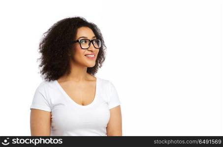 vision, body positive and people concept - happy african american woman in white t-shirt and glasses. african american woman in white t-shirt. african american woman in white t-shirt