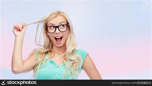 vision, education and people concept - happy smiling young woman or teenage girl glasses over pink background