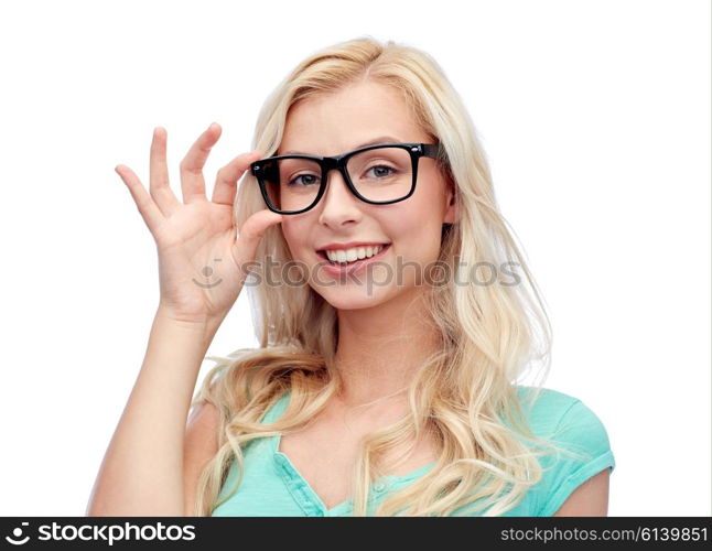 vision, education and people concept - happy smiling young woman or teenage girl glasses