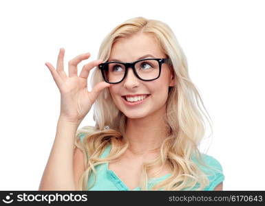 vision, education and people concept - happy smiling young woman or teenage girl glasses