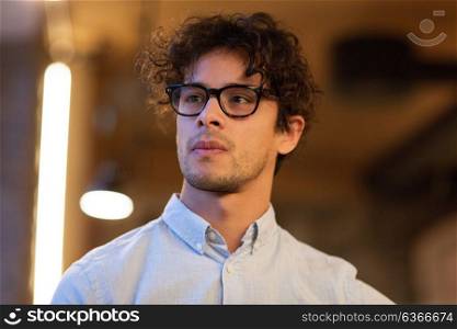 vision, eyewear and people concept - portrait of man in glasses. portrait of man in glasses