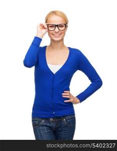 vision, health and people concept - smiling woman in casual clothes wearing black eyeglasses