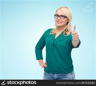 vision, optics, education, gesture and people concept - smiling young woman with eyeglasses showing thumbs up over blue background