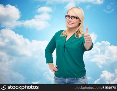 vision, optics, education, gesture and people concept - smiling young woman with eyeglasses showing thumbs up over blue sky and clouds background