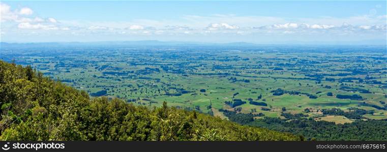 Vista of the Waikato region from Mt Pirongia. Vista of the Waikato region from Mt Pirongia, with Sanctuary Mountain in the background