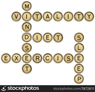 vitality, diet, mindset, sleep and exercise crossword in old round typewriter keys isolated on white