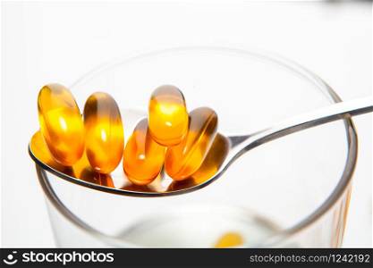 Vitamin capsule fish oil for healthy concept